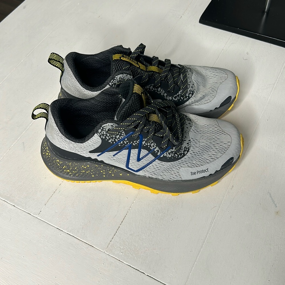 New balance, gray, and yellow sneakers size for big kids